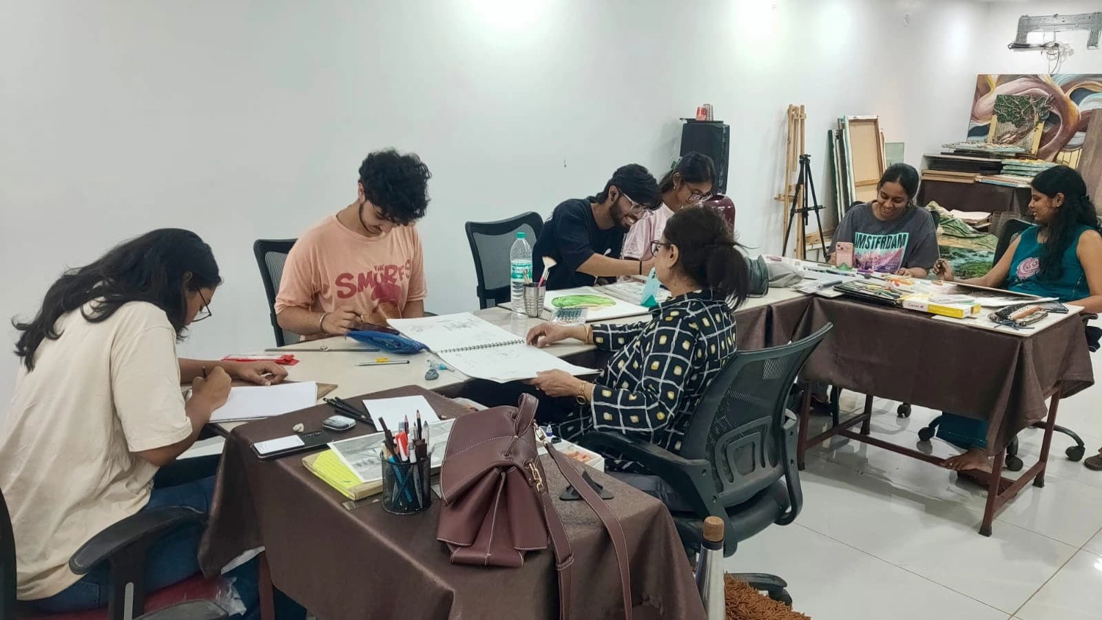 Students painting together at Sejain Art Academy